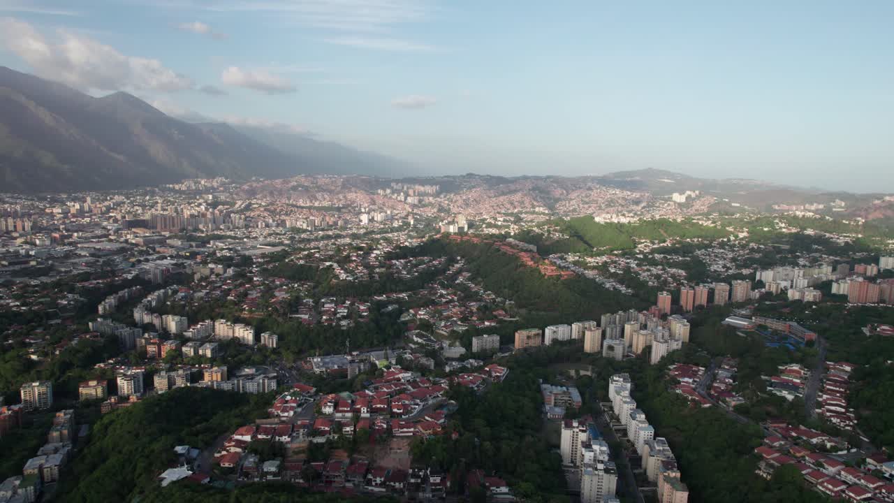 Aerial View of a Cityscape with Mountains