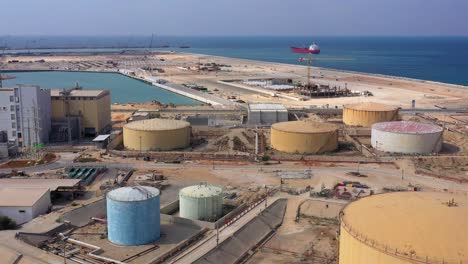 aerial footage over fuel tanks close to power plant