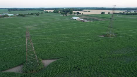 parallax circle around cinematic flyover of power lines farmland farm country