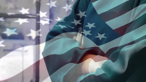 animación de la bandera de los estados unidos ondeando sobre los cirujanos en el quirófano