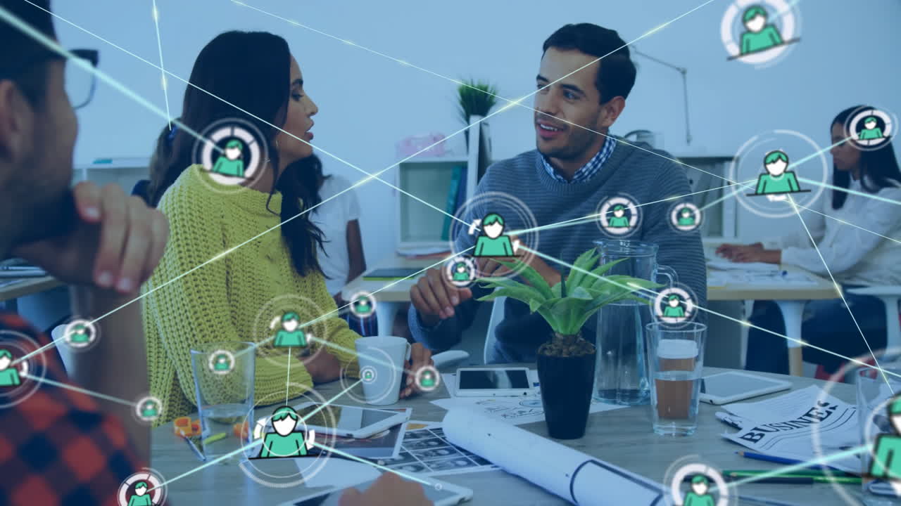 Animation of network of connections with icons over diverse colleagues discussing work