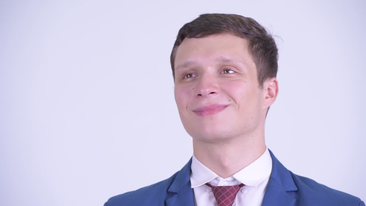 행복한 젊은 잘생긴 사업가