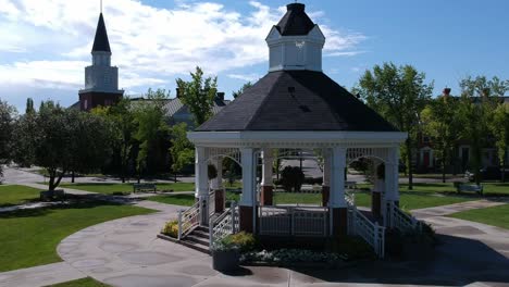Gazebo-town-square-with-clock-tower-dated-back-from-a-replical-1800s-community-commonly-used-for-wedding,-and-community-gathers