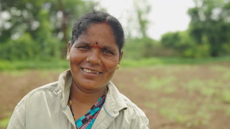 portraits of rural indian woman in agricultural field