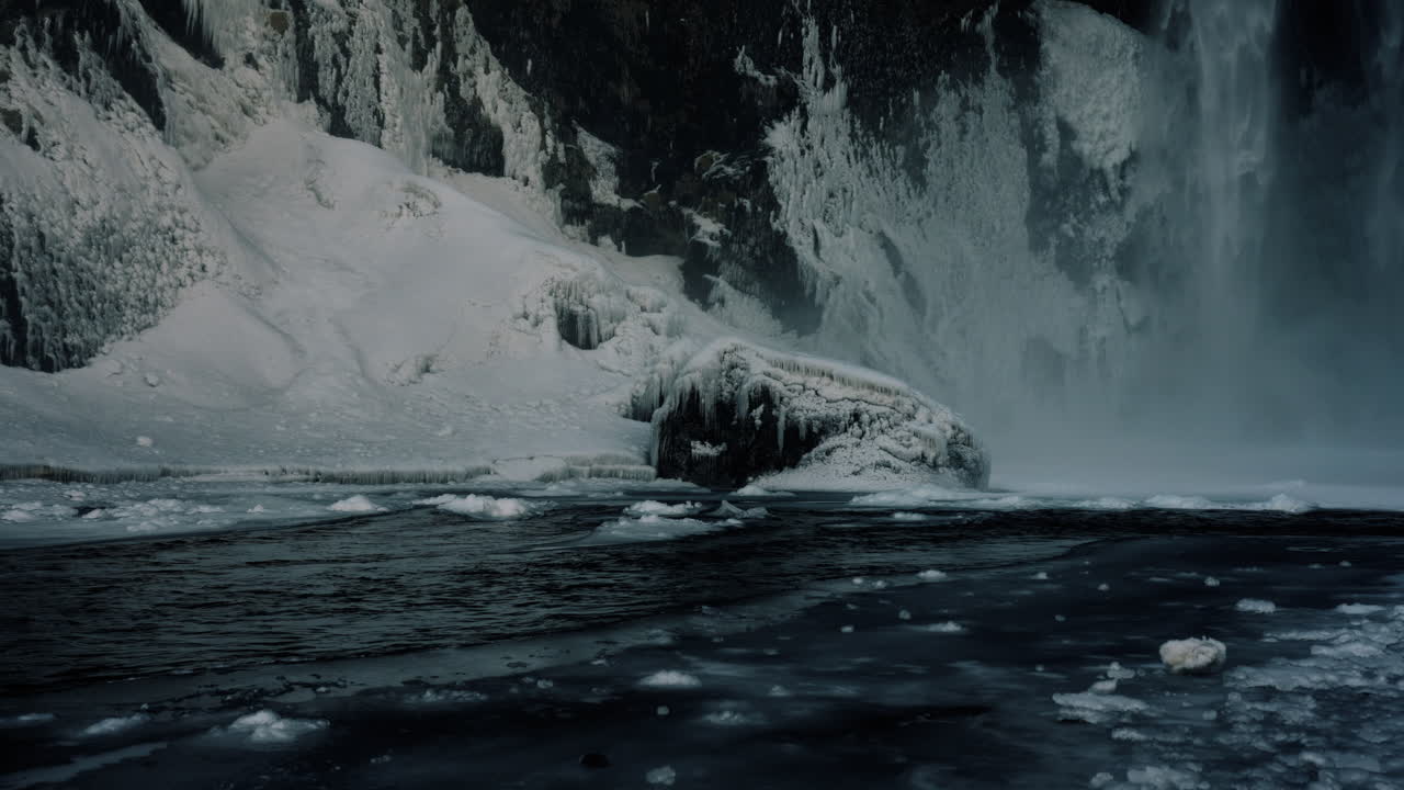 Frozen Waterfall in Winter Landscape