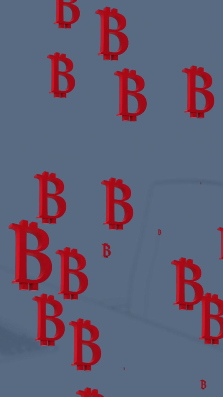 Animazione di icone Bitcoin su un ufficio