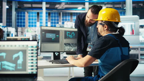 manager showing engineer upgrades needed after inspecting solar plant machinery