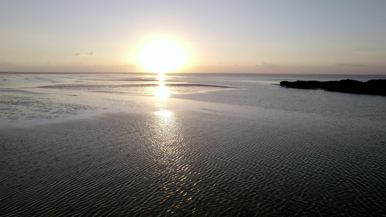 Drone shot view of the beach Water island with sunset sky