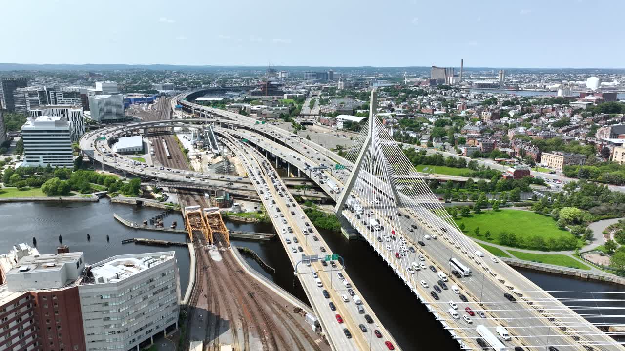 Drone shot of traffic building up on Boston's bridges