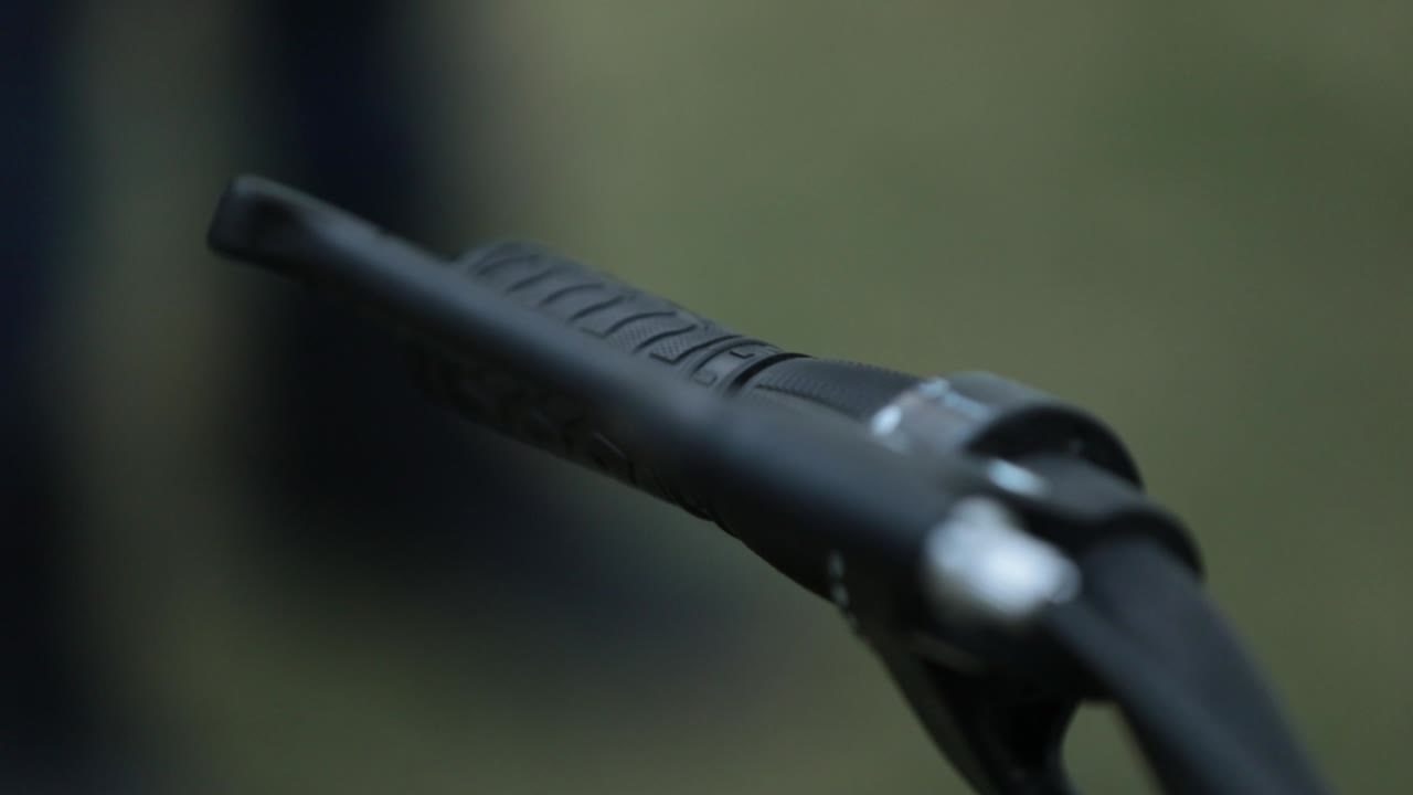 The steering wheel and brake levers of a bicycle are tested