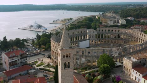 aerial: pula city, istria county croatia, ancient roman pula arena amphitheatre