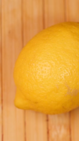 Spinning a ripe lemon citrus fruit