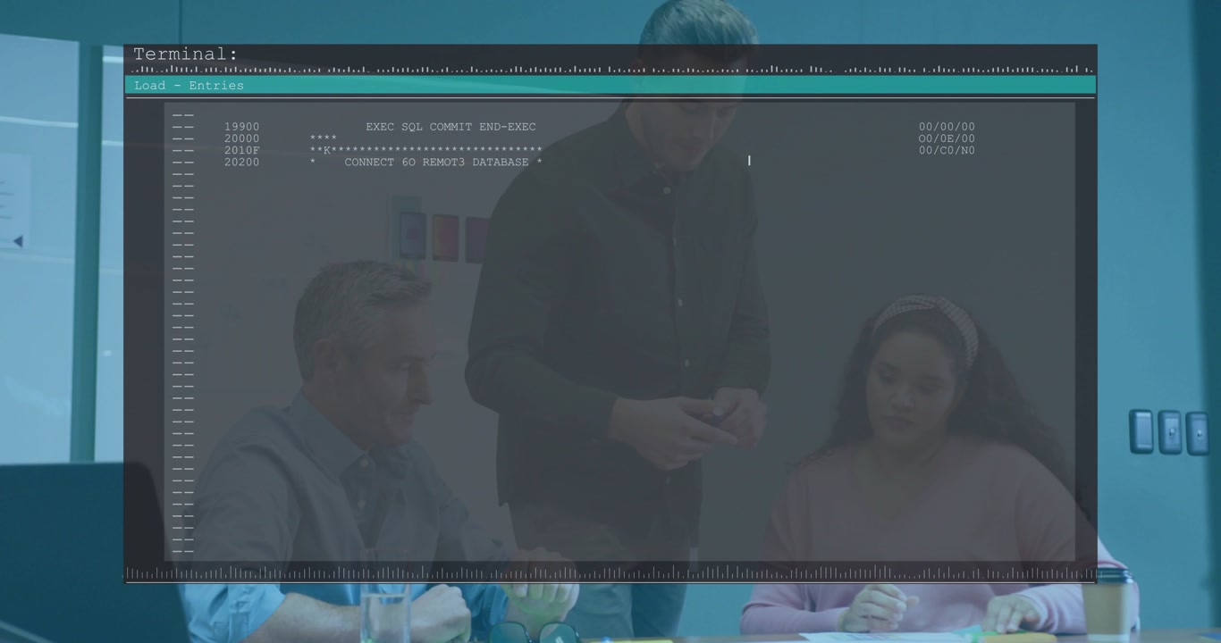 Standing man grabbing pen, team reviewing docs, causing terminal overlay showing code for tech