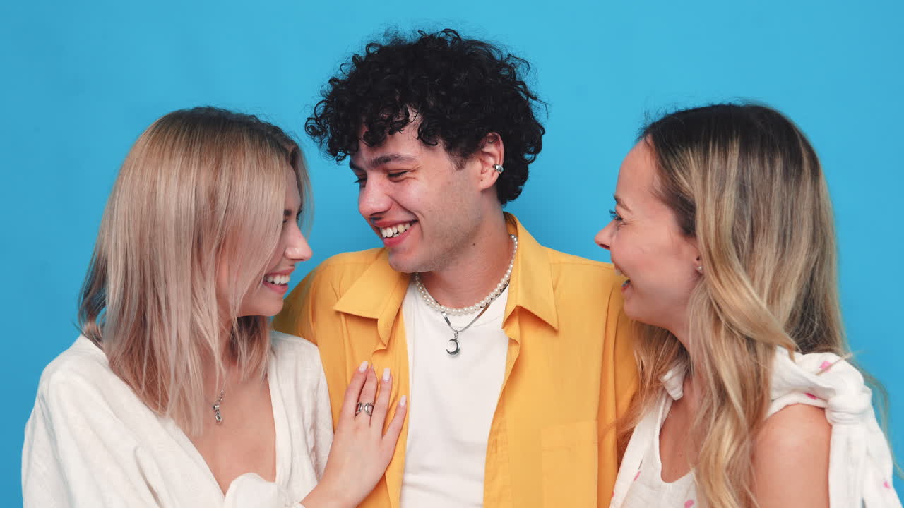 Three friends laughing together