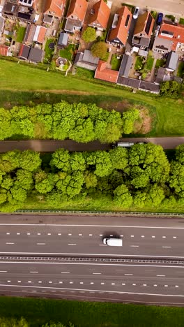 aerial view of dutch residential area with highway