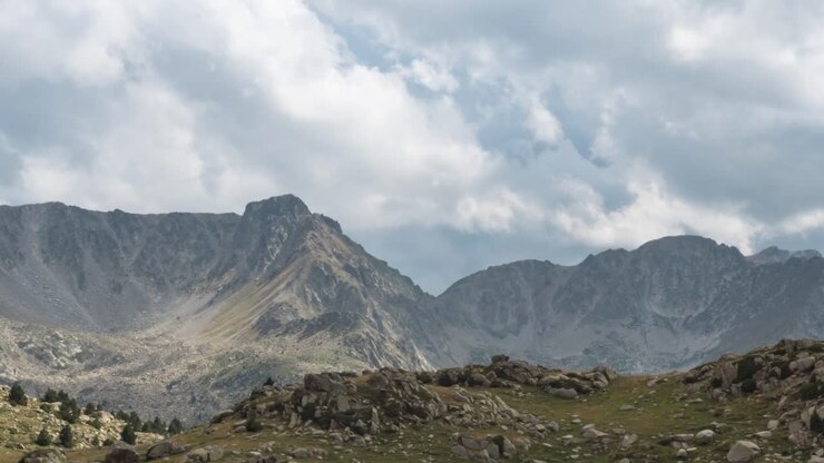 Panorama Of Clouds Moving Over The Pyrenees Mountain Range On A Sunny Summer Day In Andorra, Spain