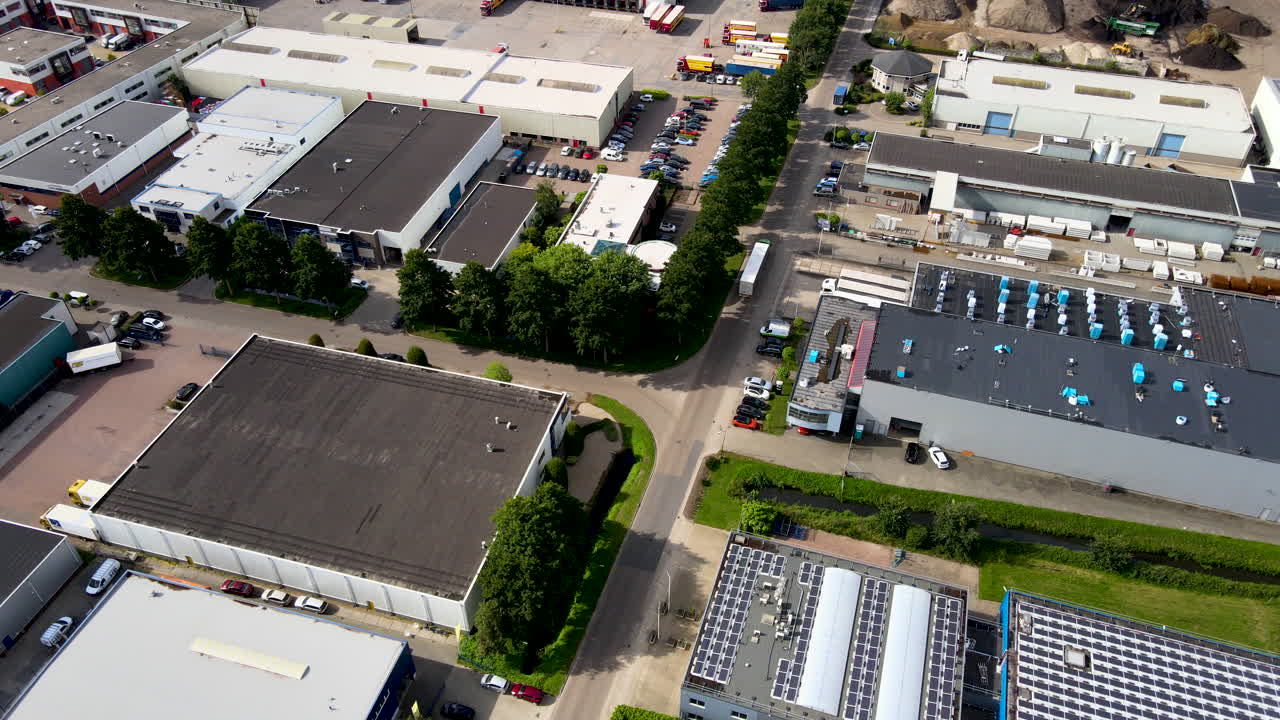 Aerial of truck driving over large industrial terrain
