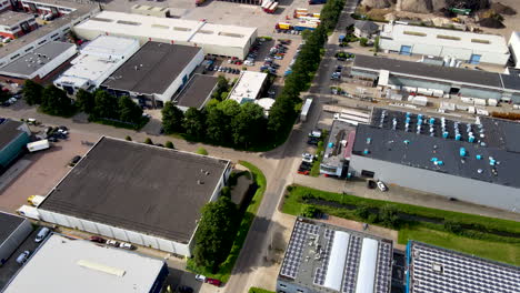 aerial of truck driving over large industrial terrain