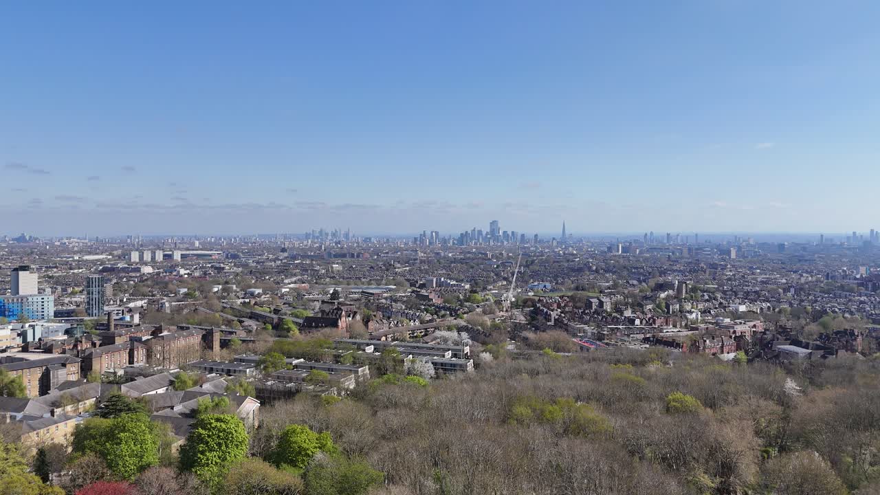 London city skyline establishing descending aerial shot viewed from Highgate