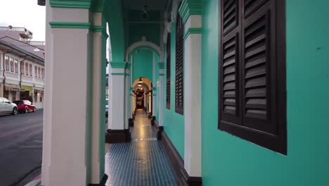 historic arcade and street scene in southeast asian old town