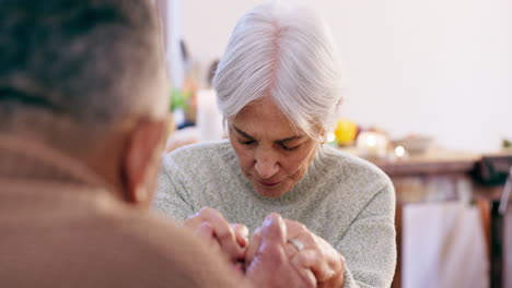 Old-couple,-people-are-holding-hands-and-praying