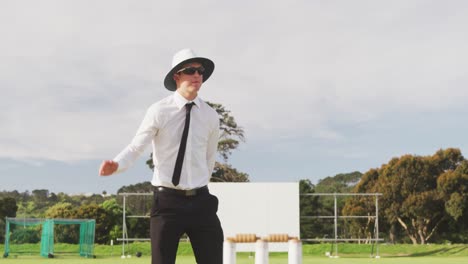 Cricket-umpire-making-signs-standing-on-a-cricket-pitch