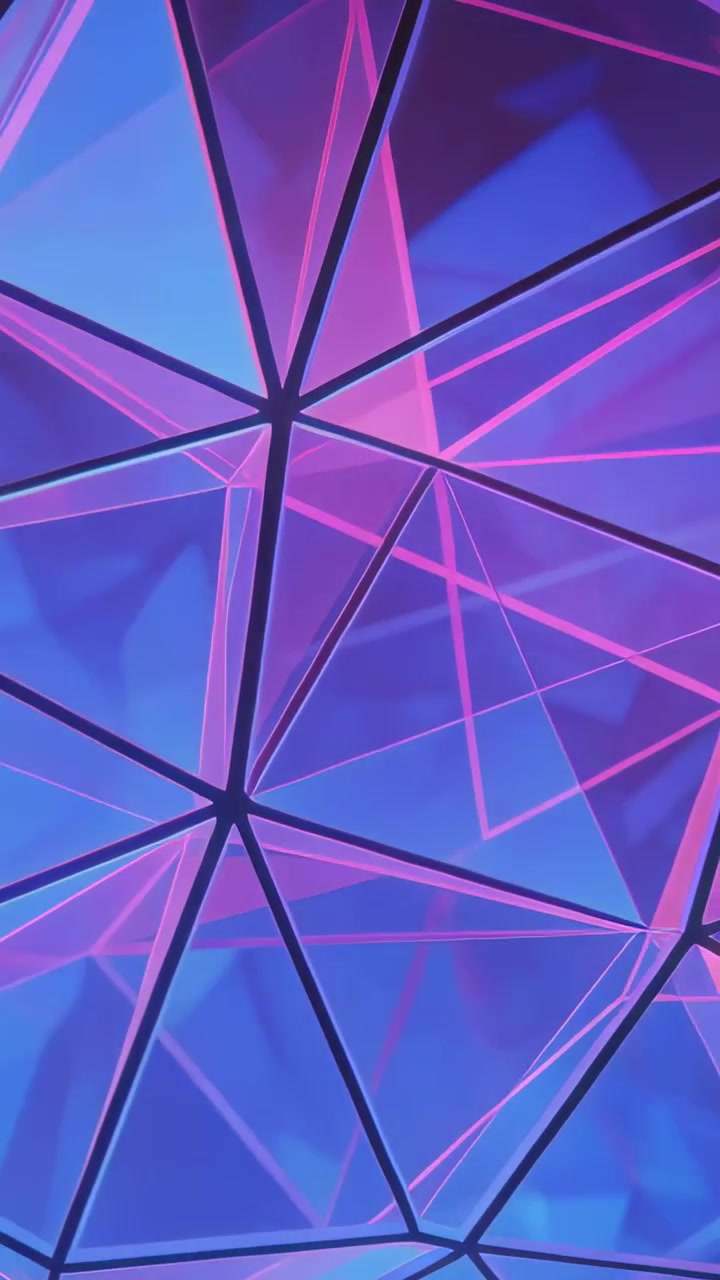 Video verticale: Panoramica in movimento che rivela triangoli che catturano il neon, creando sfumature in evoluzione in studio
