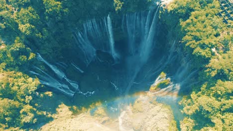 tumpak sewu rainbow waterfalls aerial scenic view, indonesia