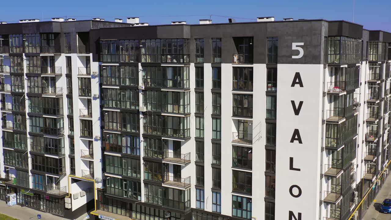 Drone aerial footage of buildings. Aerial view of apartment blocks in city