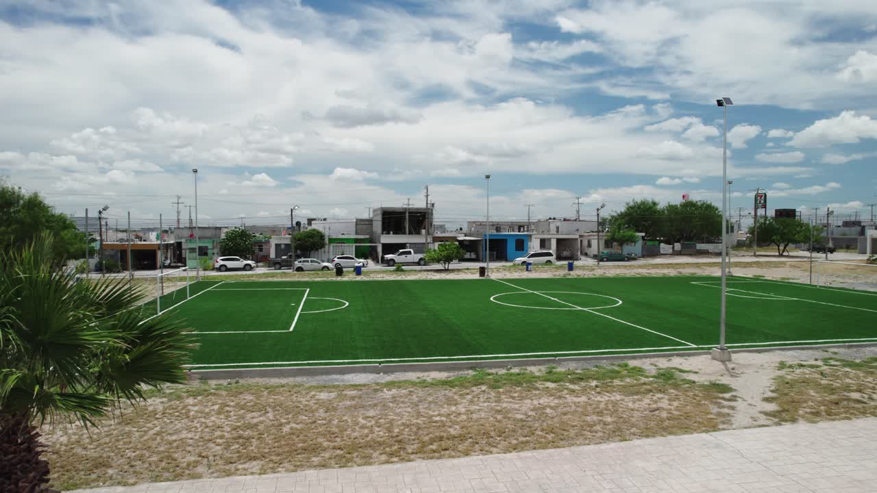 Green Football Pitch: Artificial Turf in a Public Park Set
