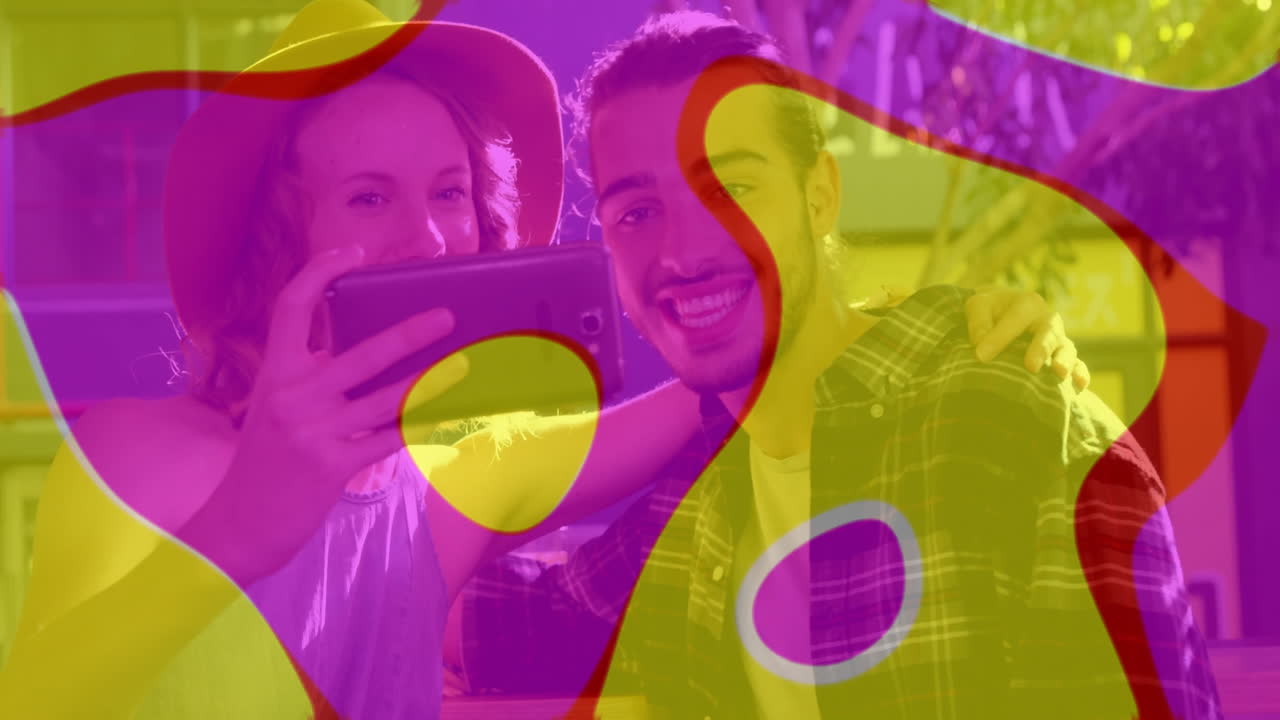 Taking selfie, friends with colorful animation shapes overlay, smiling together