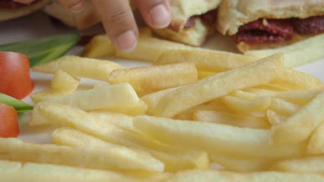 fries and sandwiches on a plate