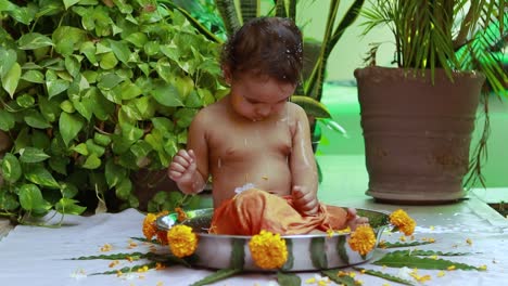 cute-toddler-baby-boy-bathing-in-decorated-bathtub-at-outdoor-from-unique-perspective