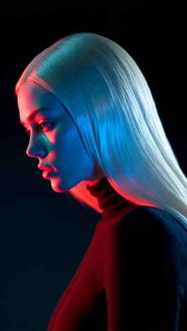 dramatic neon lit portraits of a blonde woman