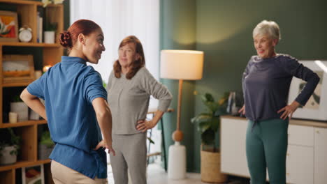 senior women participating in a group fitness class with instructor