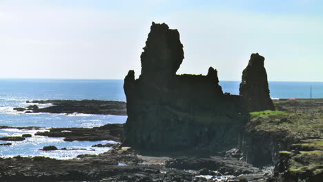 londrangar - basaltic rock formation pinnacles on snaefellsnes peninsula, iceland view from hellnar