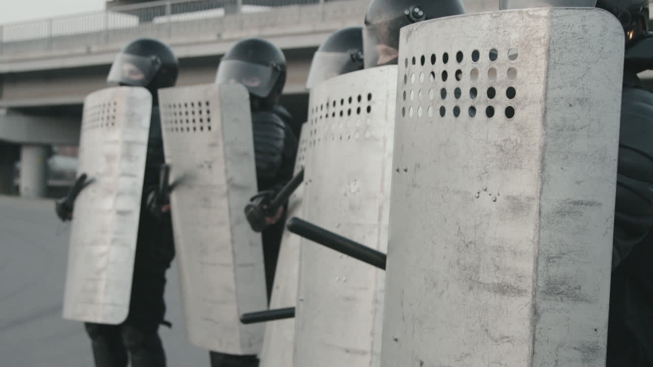Riot Police with Shields and Batons