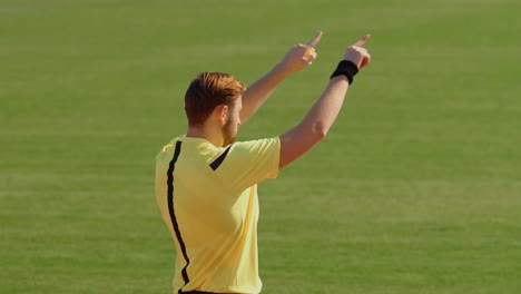 football soccer referee showing var video assistant referee with hands, 75fps