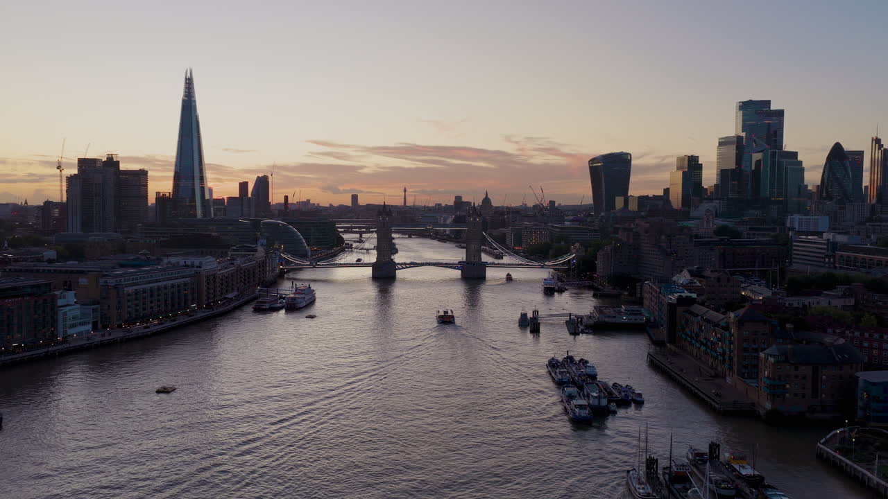London cityscape featuring Tower Bridge and The Shard at dusk