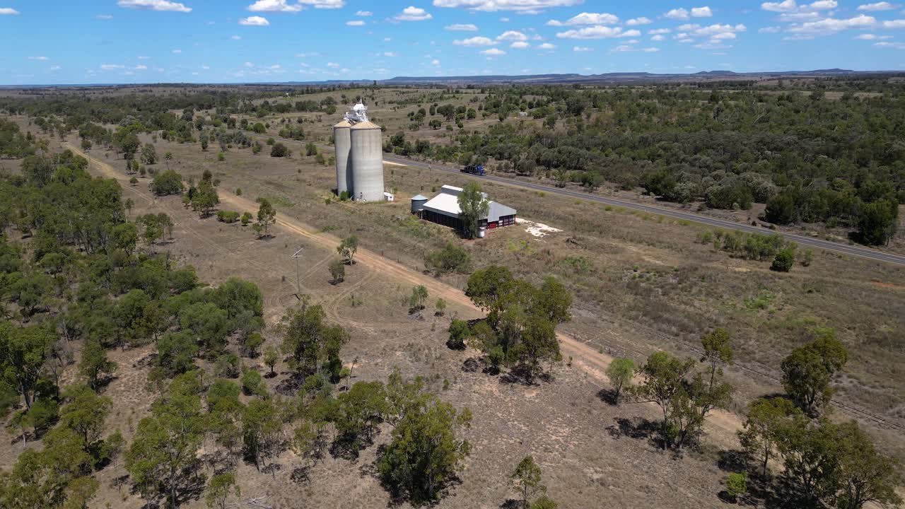 Aerial View of Australian Outback Farm with Silos
