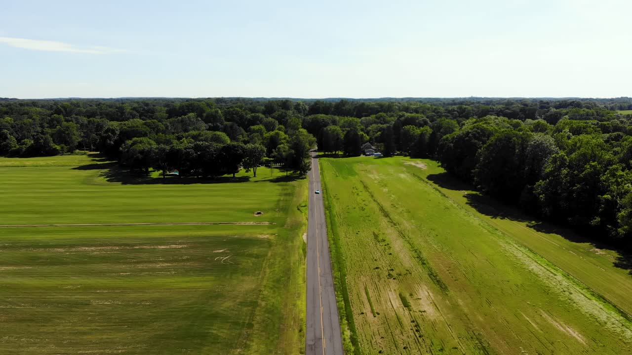 Stunning 4k aerial view of a classic 1970 Corvette driving
