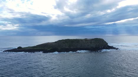 early morning sunrise lights up cook island aquatic reserve with the gold coast city in the foreground