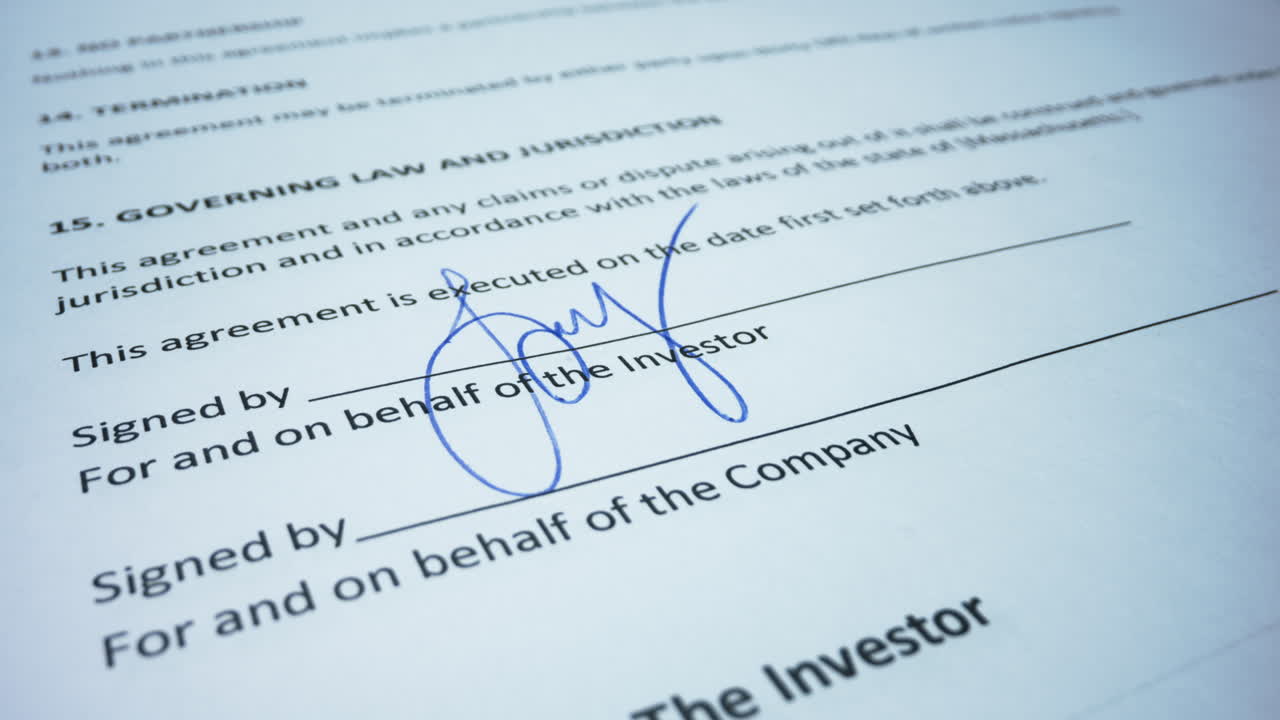 Business woman hand signing document with pen. Female signing business contract