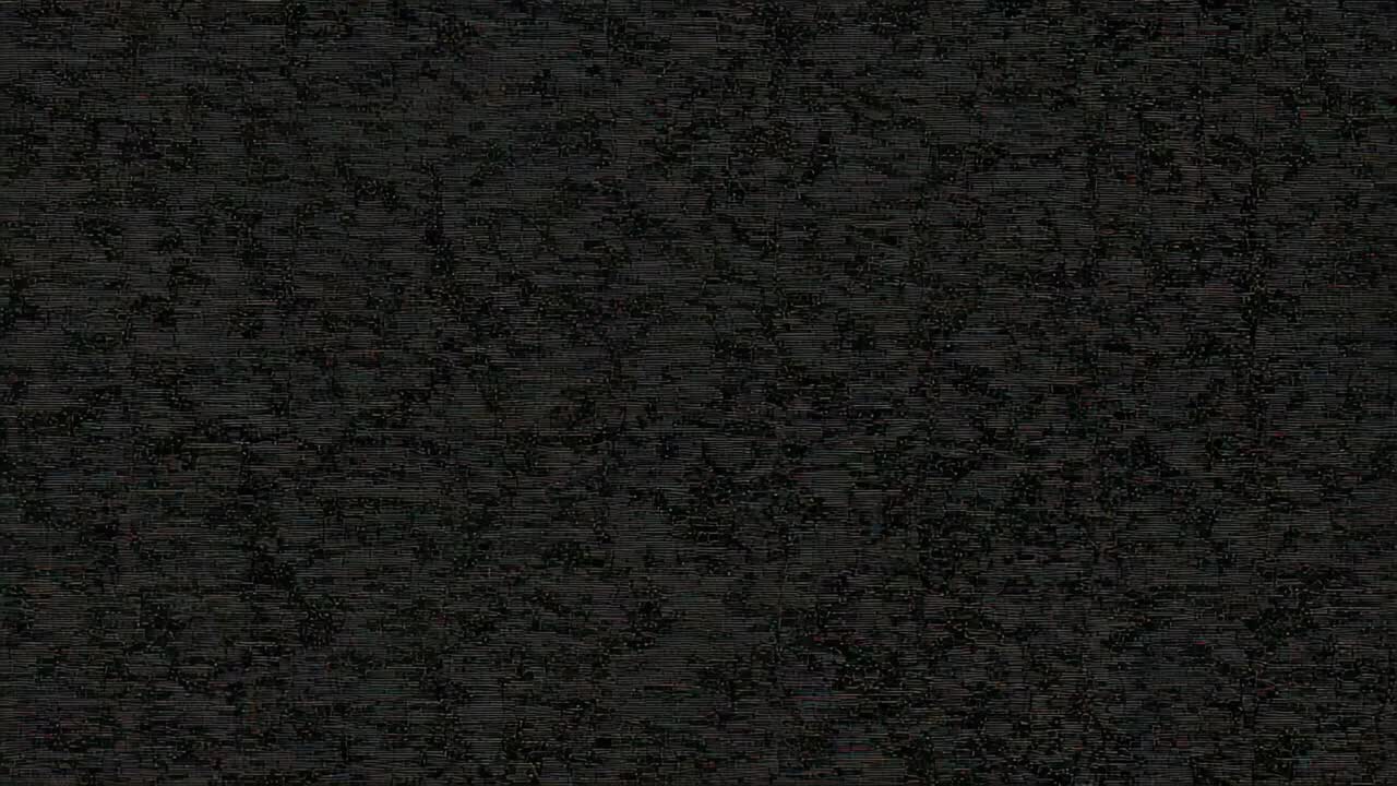 Starting playback screen displaying dark grey static noise with fine-grain texture continuously