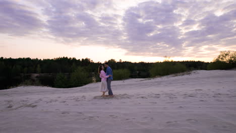 couple on top of a dune