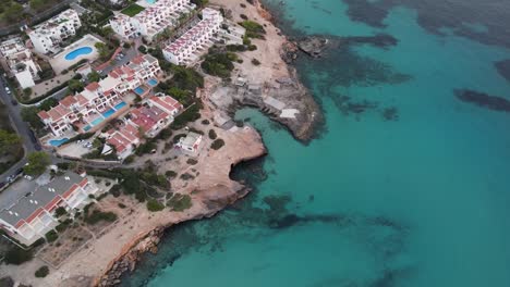 Toma-Aérea-De-Cala-Tarida,-Ibiza-Cala-Tarida