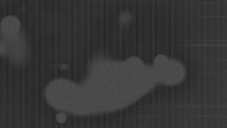 Animation-of-gray-spots-moving-on-gray-background