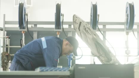 mechanic repairing a car