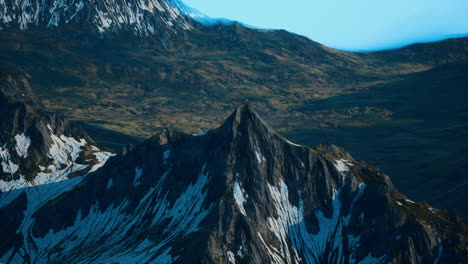 aerial view of a majestic snow-capped mountain peak