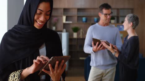 female executive using digital tablet in office 4k